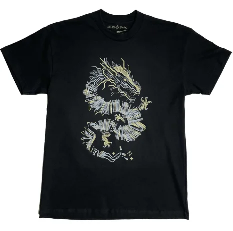 Person wearing a stylish graphic tee with jeans